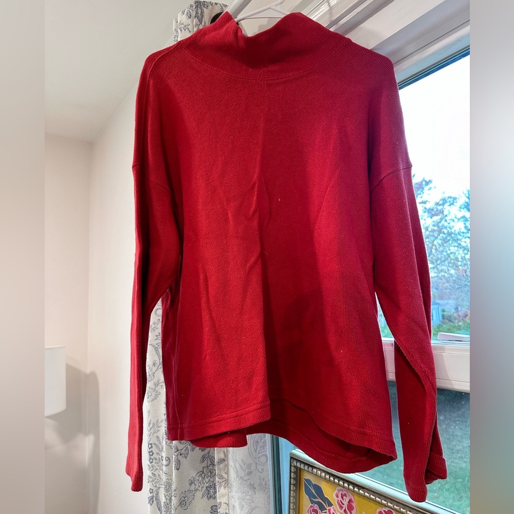 Red turtleneck sweater